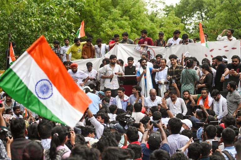 Founder of the Cockroach Janta Party (CJP) Abhijeet Dipke speaks during a protest at the Jantar Mantar