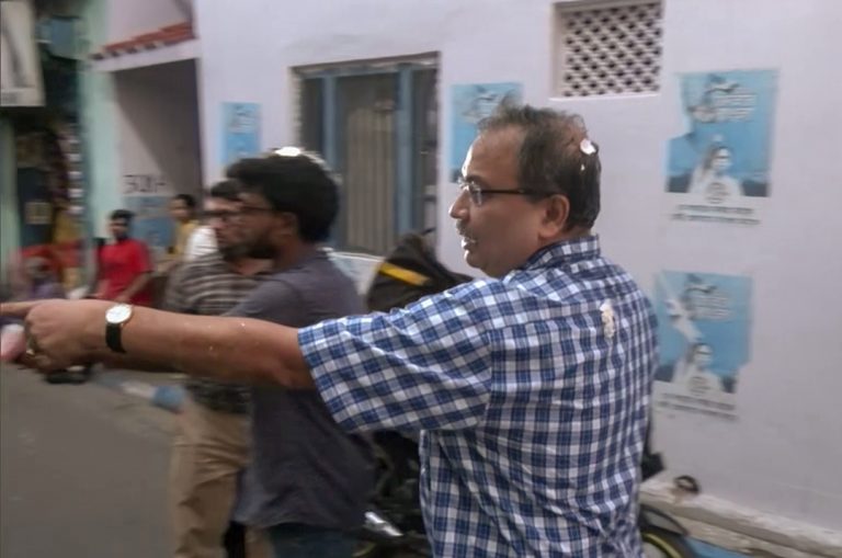 A local youngster hurls an egg at TMC MLA Kunal Ghosh