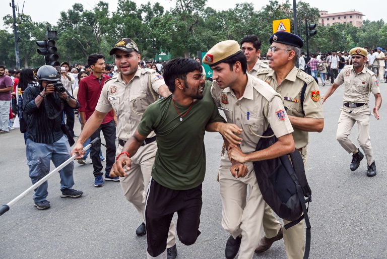 Protesters and Police personnel scuffle during CJP protest