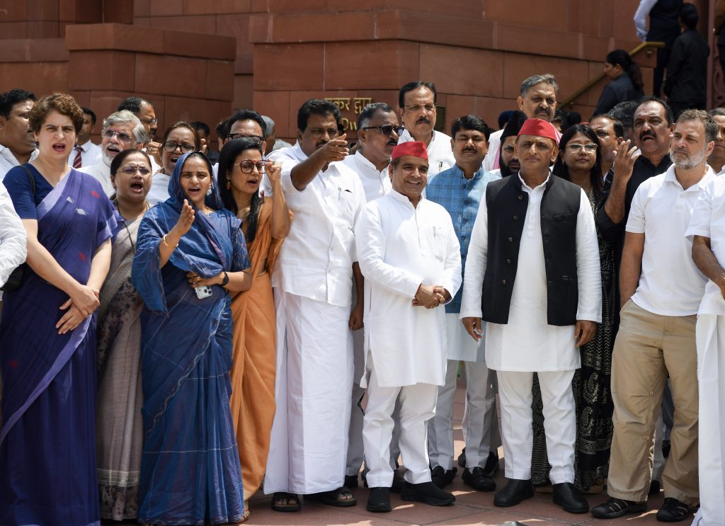 Lok Sabha LoP Rahul Gandhi, Congress MP Priyanka Gandhi, and Samajwadi Party national president Akhilesh Yadav with Opposition MPs as they protest at Makar Dwar during the ongoing Monsoon Session of Parliament