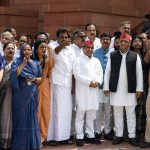 Lok Sabha LoP Rahul Gandhi, Congress MP Priyanka Gandhi, and Samajwadi Party national president Akhilesh Yadav with Opposition MPs as they protest at Makar Dwar during the ongoing Monsoon Session of Parliament