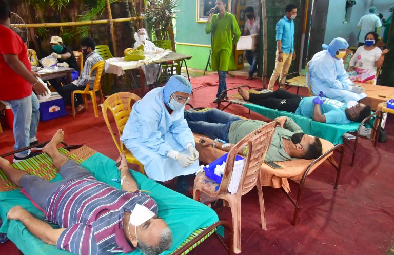 People donate the blood in the blood donation camp